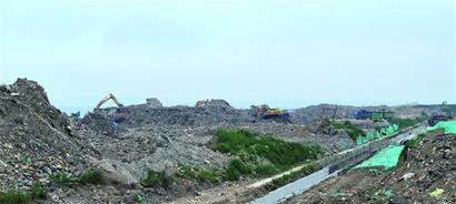 “零碳園區(qū)”南側(cè)一處空地原本是臭氣熏天的垃圾堆放地,經(jīng)過改造后如今成為休閑打卡地。